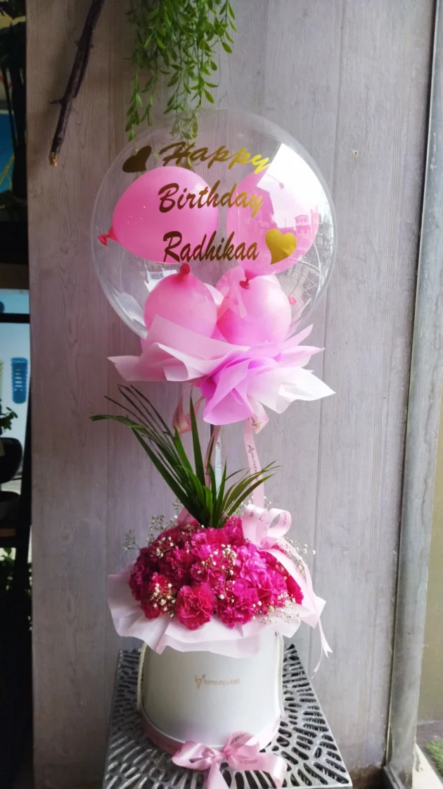 Balloon with box of carnations