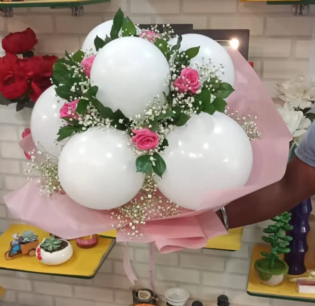 Handtied bloom with white cloudy balloon