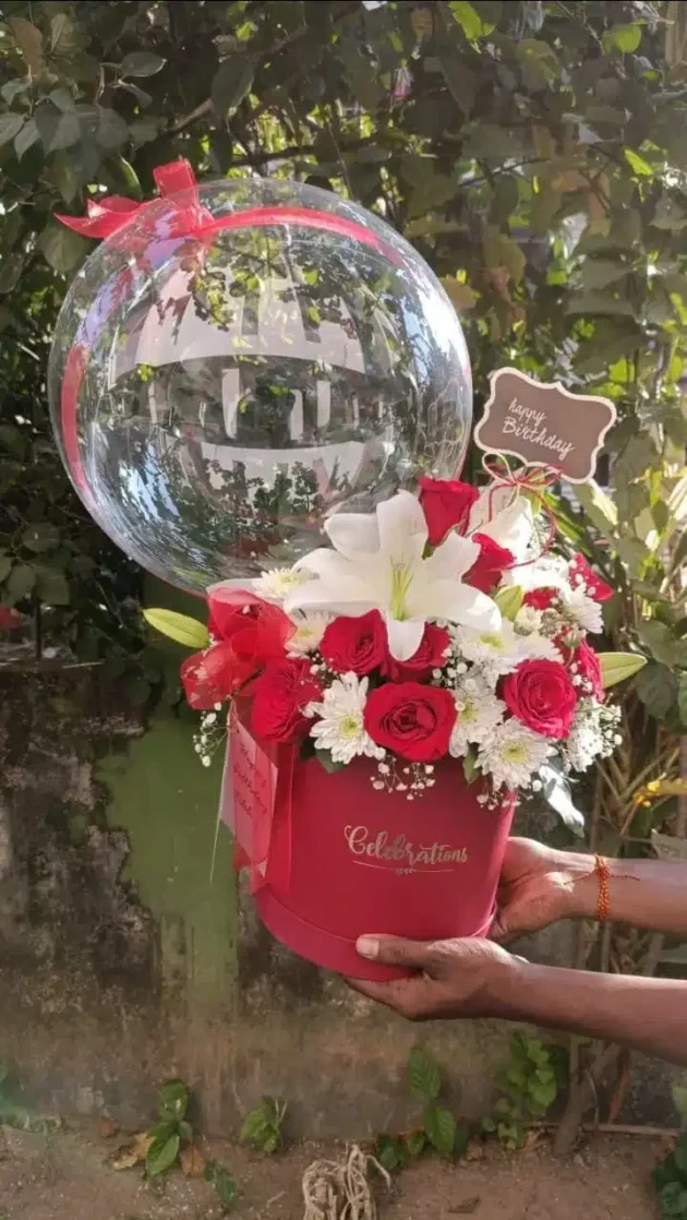 Red and white symphony with balloon topper
