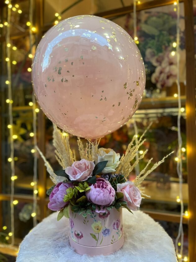 Balloon with artificial flowers to eternity