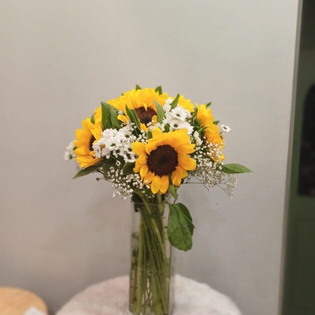 sunflower with sentini in vase