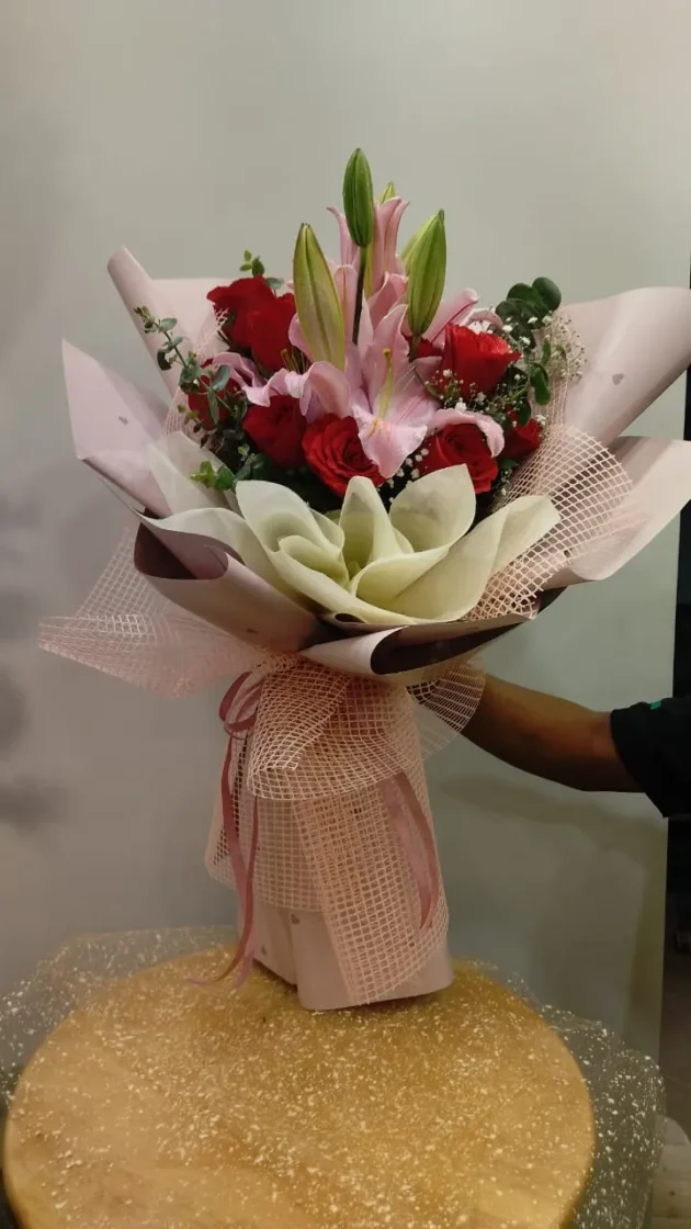 Beautifully Tied pink & Red flowers Bouquet
