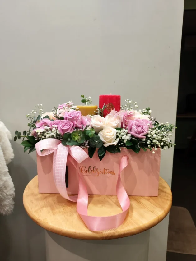 Beauty in pink box with candles