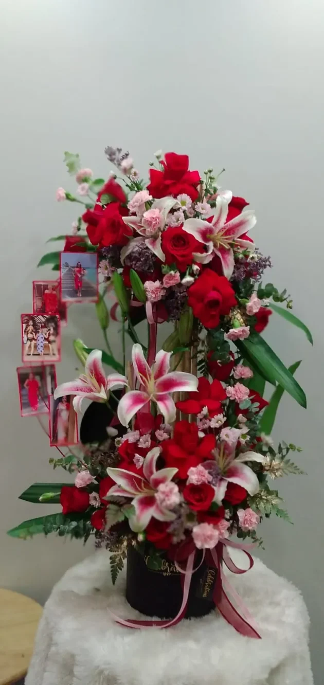 Classic lilies n red rose arrangement with photos