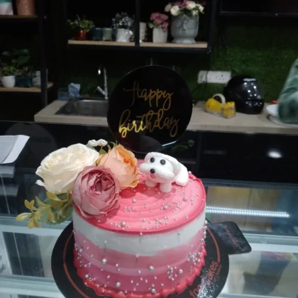 Cute puppy n floral cake