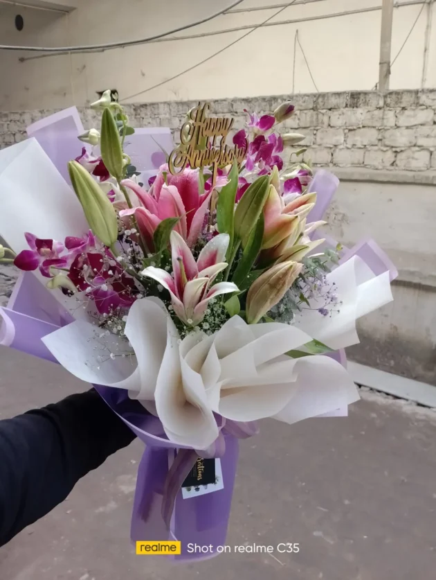 Gorgeous Purple Orchids & White Lilies hand Arrangement