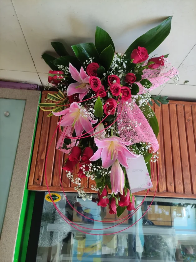 Red rose pink lilies arrangement