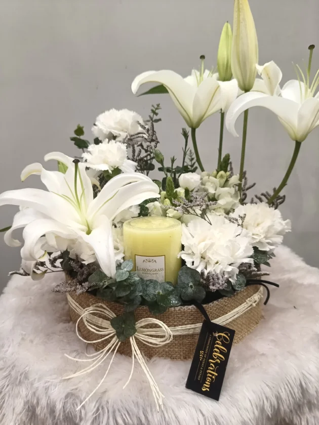 White Lilies and scented candle arrangement