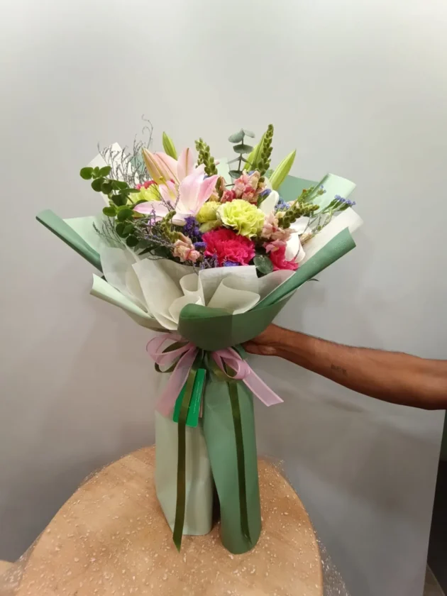 dressed with green wrap bouquet