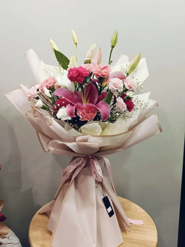 pink lily and carnations bunch